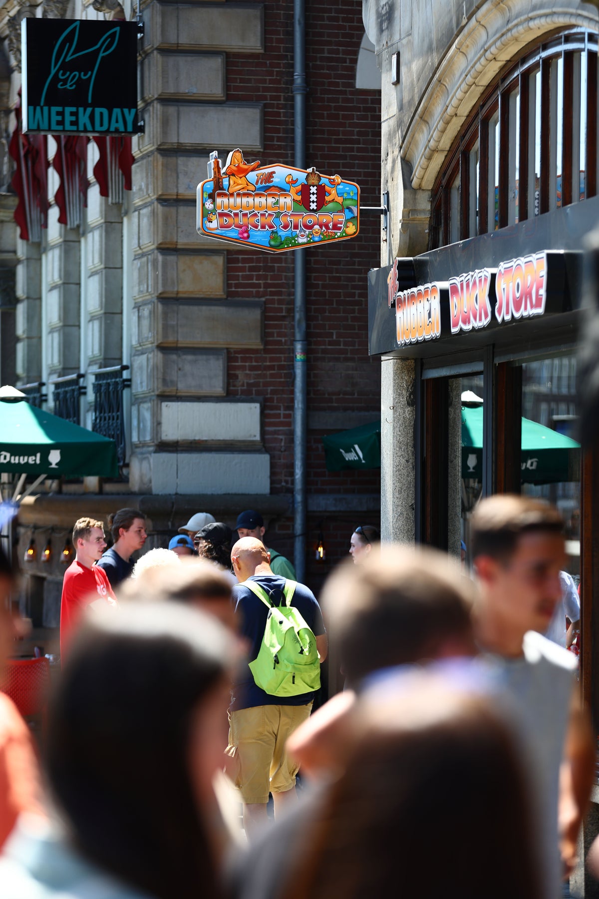 The Rubber Duck Store on a busy shopping street in Amsterdam